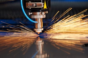 Industrial Laser cutting processing manufacture technology of flat sheet metal steel material with sparks